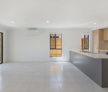 A modern sanctuary in a peaceful, family-friendly pocket, this beau... - Photo 2