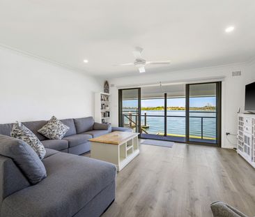 Fully Furnished River Frontage Home! - Photo 1