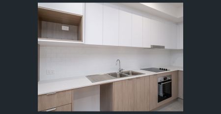 BRAND NEW APARTMENT IN BRAND NEW COMPLEX - Photo 4