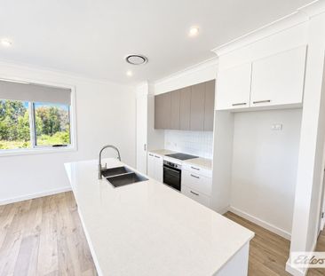Near New, Architecturally Designed Villa with Spacious Yard - Photo 3