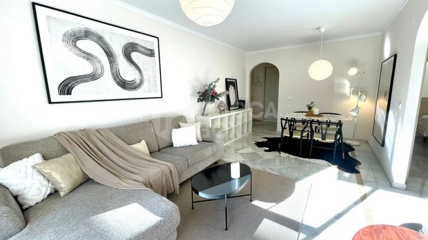 Elegant Two-Bedroom Apartment with Terrace in Prestigious Gated Community - Photo 1