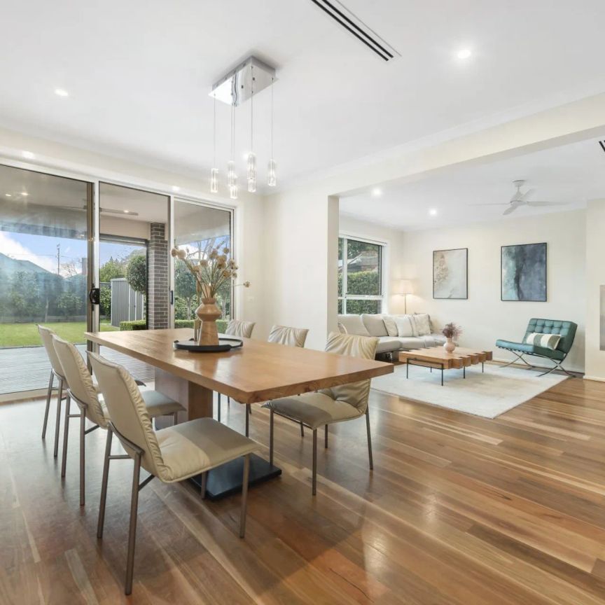 Prestige Family Home with Poolside Luxury & High-End Comfort - Photo 1