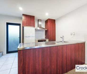 Two large bedroom townhouse style unit comes with two carparks - Photo 3