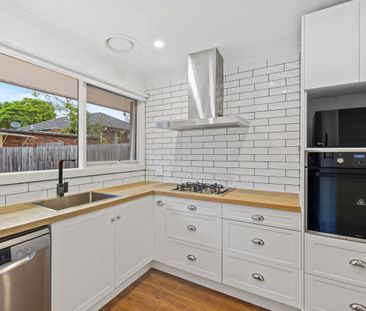 Impeccably renovated with effortless living in an exceptional location - Photo 3