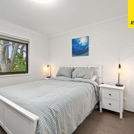 Easy-Care Living, Close to It All - Photo 5