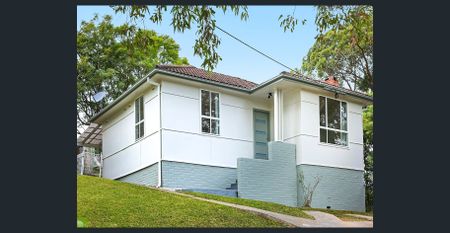 Renovated Home with Lawn Maintenance Included! - Photo 2