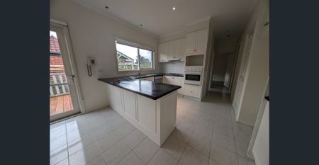 Conveniently located low maintenance living - Photo 5