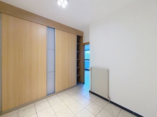 Gelijkvloers appartement 51m² met groot terras - Foto 1