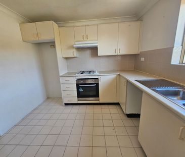 MODERN TWO BEDROOM APARTMENT IN A GATED COMMMUNITY - Photo 6