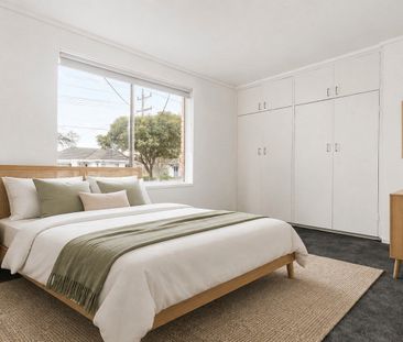 Stylish Two-Bedroom Living in a Convenient Location - Photo 3