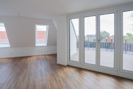 Eleganz und Großzügigkeit auf über ca. 129 m² - Einzigartige DG-Wohnung mit Panorama-Terrasse - Photo 2