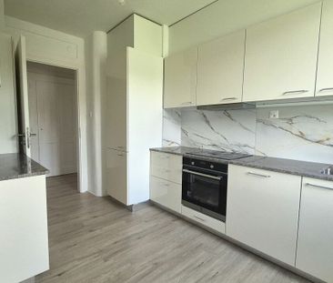 Rénové ! Appartement de 4 pièces au Locle avec balcon - Photo 5