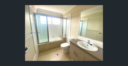 Modern 4-Bedroom Home in Prime Coomera Location - Photo 5