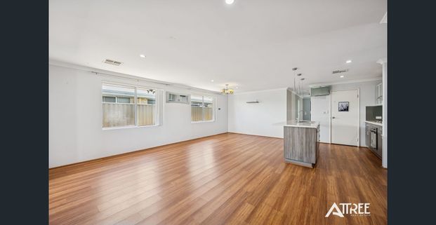 Modern Family Living in a Prime Harrisdale Location - Photo 1