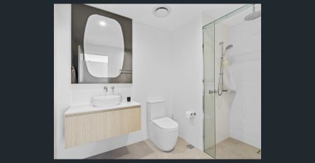 Modern Waterfront Apartment with Panoramic Broadwater Views! - Photo 4