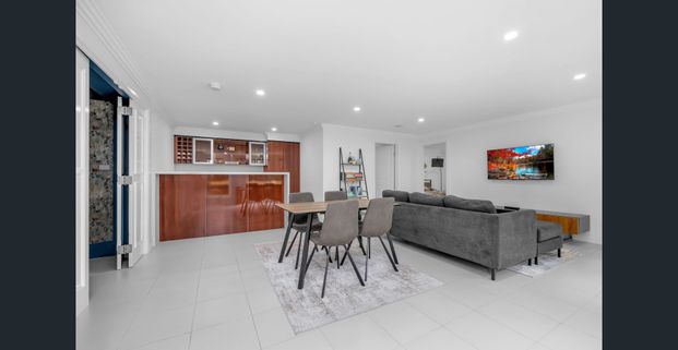 Exceptional Family Living with Multiple Entertainment Areas! - Photo 1