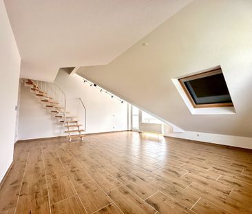 Ansprechende Maisonette-Wohnung mit Einbauküche und Loggia in zentr... - Foto 1
