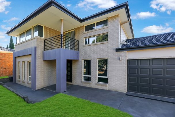 EXTRA LARGE FAMILY HOME IN EXCLUSIVE POCKET OF WANTIRNA SOUTH - Photo 1