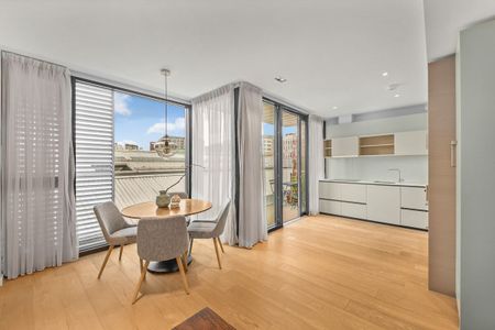 A bright and beautifully presented two-bedroom, two‑bathroom apartment set on the third floor of the highly sought‑after Arthouse development. - Photo 3