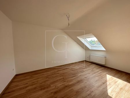 Erstbezug nach Modernisierung von heller gemütlicher DG-Wohnung - Photo 2