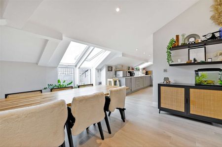 A modern two bedroom upper floor apartment with allocated, gated parking. - Photo 3