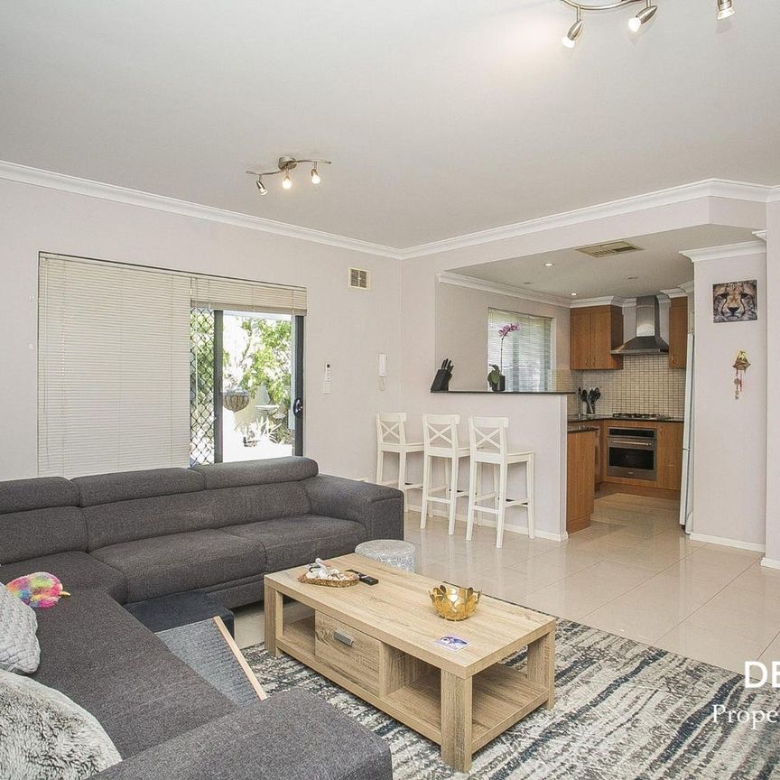 LOW MAINTENANCE IN CONVENIENT LOCATION - Photo 1