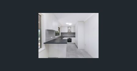 Beautifully Renovated with Sunroom - Photo 4