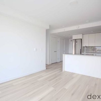 RENT COMMERCIAL DRIVE! BRAND-NEW PET-FRIENDLY 1 BED + DEN APARTMENTS! - Photo 1