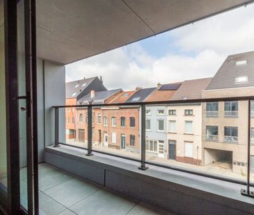 Nieuwbouwappartement met staanplaats en kelder nabij centrum! - Photo 1