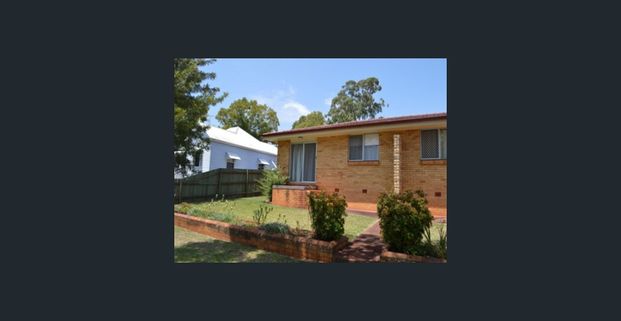 AFFORABLE UNIT CLOSE TO TOWN - Photo 1