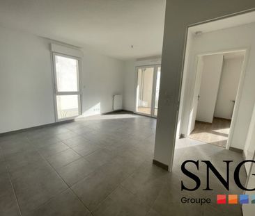 T2 AVEC LOGGIA ET UN PARKING INTERIEUR - Photo 2