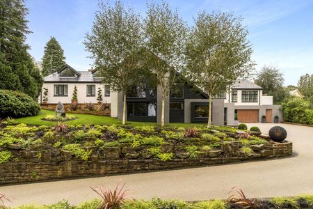 An exceptional bespoke built home in an elevated and private setting off one of the village's premier roads extending to 5299 sq ft with four bedrooms in a generous plot. - Photo 3