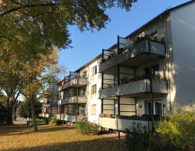 Komfortabel wohnen im Erdgeschoss mit Balkon! - Foto 1