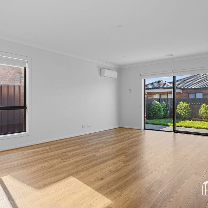 SPACIOUS FOUR-BEDROOM FAMILY HOME WITH YEAR-ROUND COMFORT - Photo 1