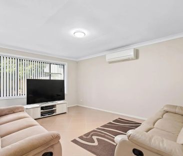 EXCEPTIONAL FAMILY LIVING IN A SOUGHT-AFTER LOCATION! - Photo 1