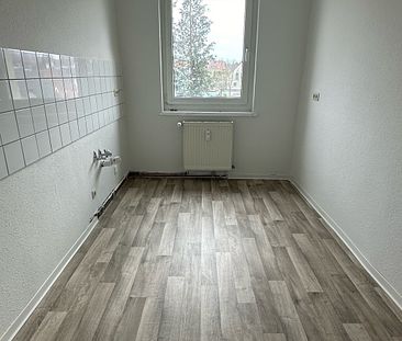 Gut geschnittene 2-Raum-Wohnung mit Balkon! - Photo 4