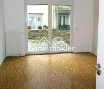 helle Erdgeschosswohnung mit großzügiger Terrasse in ruhiger Garten... - Foto 1