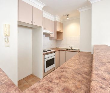 Aircon in both bedrooms and tiled floor throughout the living!!! - Photo 2