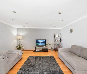 Beautifully Presented, Light Filled Home in a Sought-After Location! - Photo 1