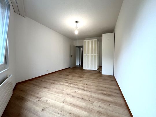 Magnifique appartement de 3,5 pièces au rez-de-chaussée avec terrasse et jardin - Photo 1
