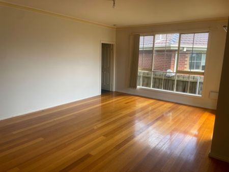 Charming Three-Bedroom Unit in Tranquil Court Location! - Photo 2