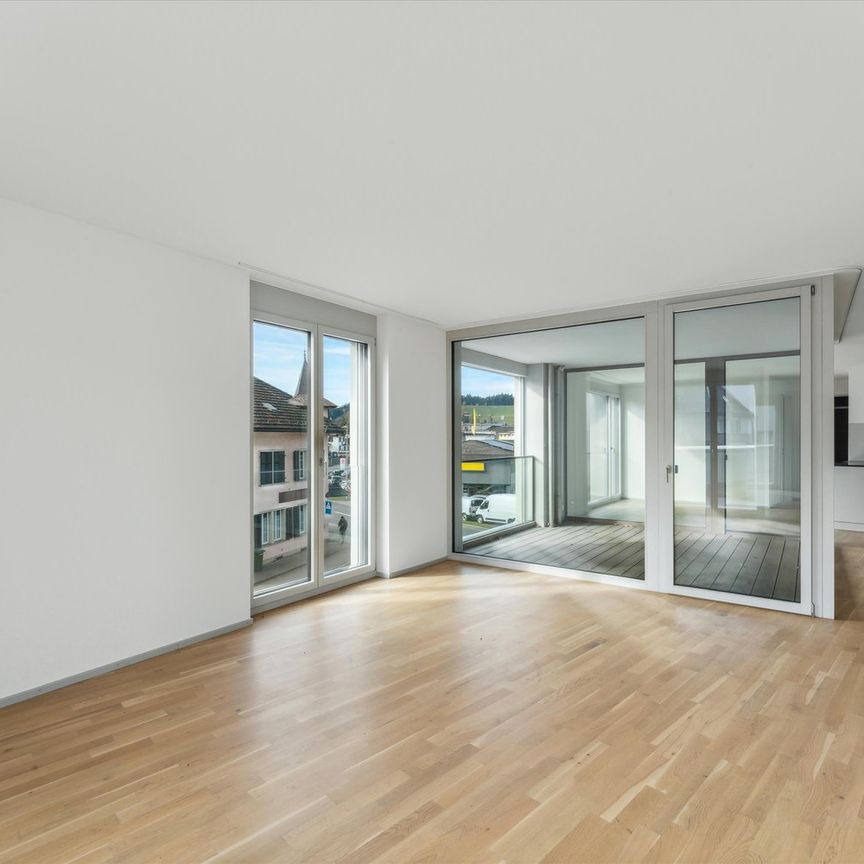 "1. Nettomietzins gratis - Modernes Wohnen & Einkaufen direkt im Haus!" - Foto 1