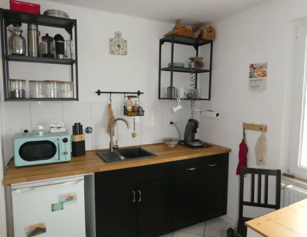 Hübsche 2-Zimmer-Dachgeschoss-Wohnung im Herzen von Asberg - Foto 1