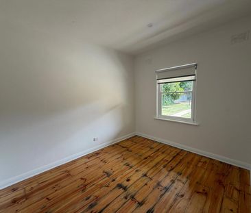 BEAUTIFULLY UPDATED THREE BEDROOM HOME IN HIGHLY SOUGHT AFTER SCHOO... - Photo 1