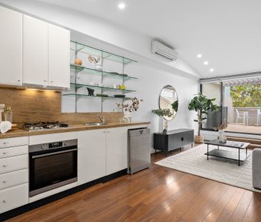 Dual Level Two Bedroom Apartment with Secure Parking, EV Charger + ... - Photo 2