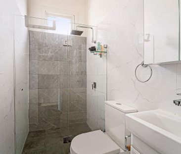 Three-bedroom home reveals modern updates - Photo 1