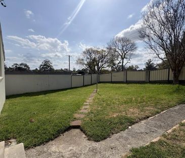 Comfortable Family Home with Spacious Yard - Photo 6