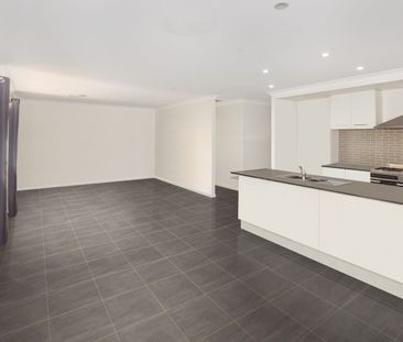 Spacious Family Home with Ducted Air & Entertaining Deck - Photo 3