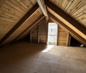 Großartige Dachgeschoßwohnung im Stadtzentrum mit Terrasse! - Photo 1