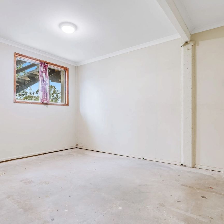 Perfect Family Living: Light-Filled Home with Fenced Yard - Photo 1